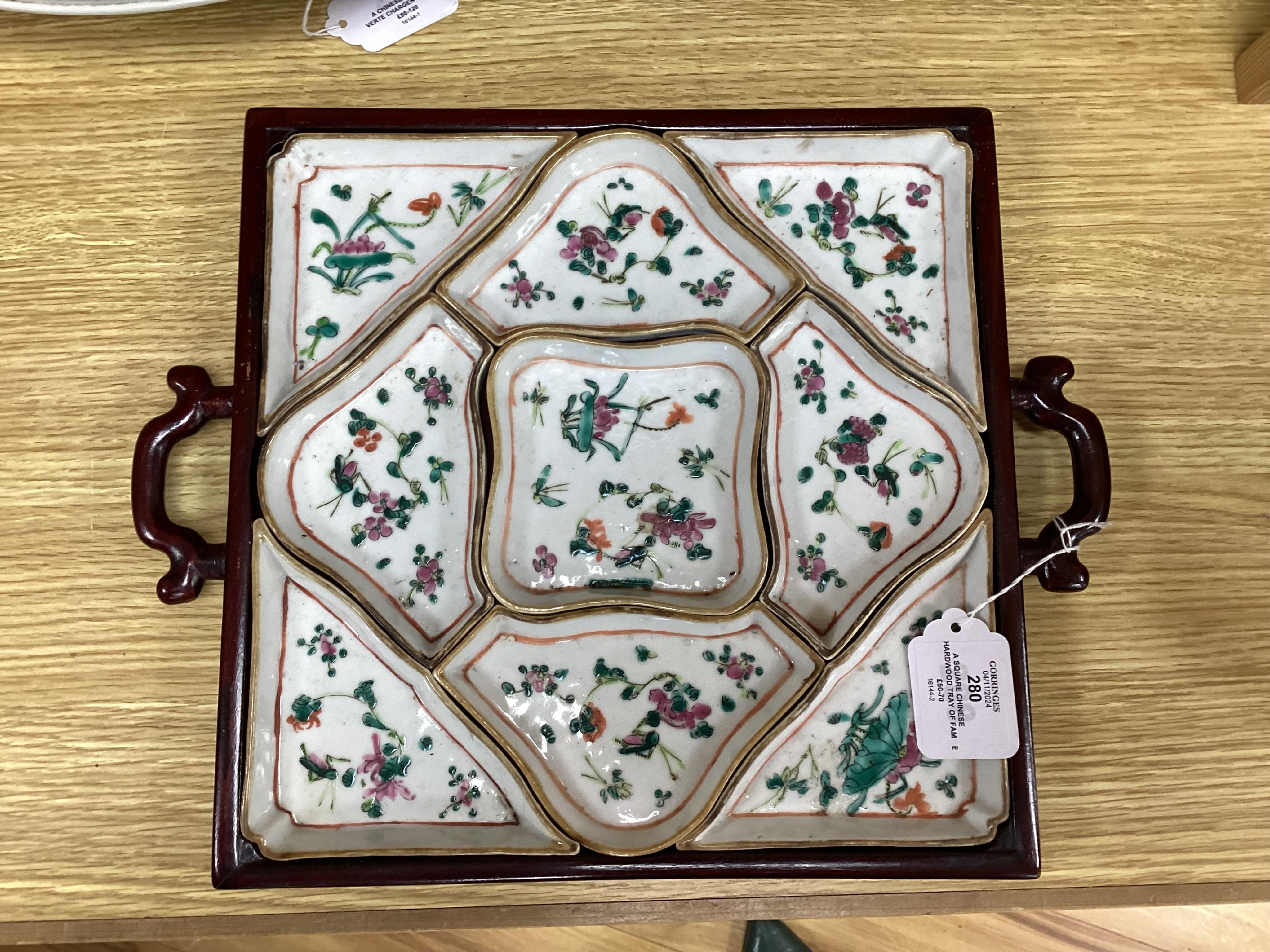 A square Chinese hardwood tray of famille rose geometric dishes, 30cm. Condition - fair to good